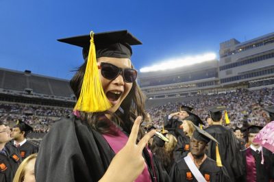 A happy graduate at the University Commencement Ceremony